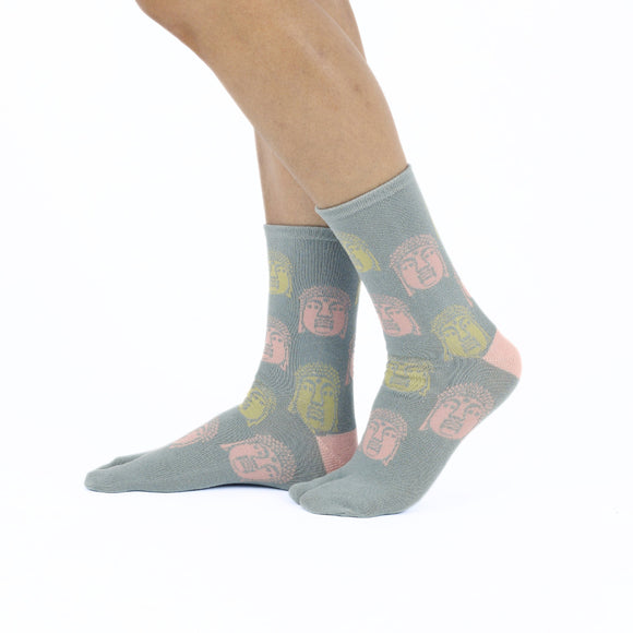 Person wearing long dull blue Tabi Socks " Nara Daibutsu ", right side view