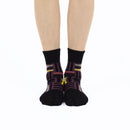 Person wearing long black Tabi Socks " Sankuzushi ", front view