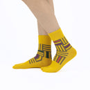 Person wearing long yellow Tabi Socks " Sankuzushi ", right side view