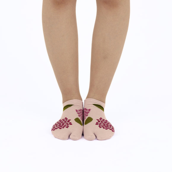 Person wearing short pink Tabi Socks " Ajisai ", front view