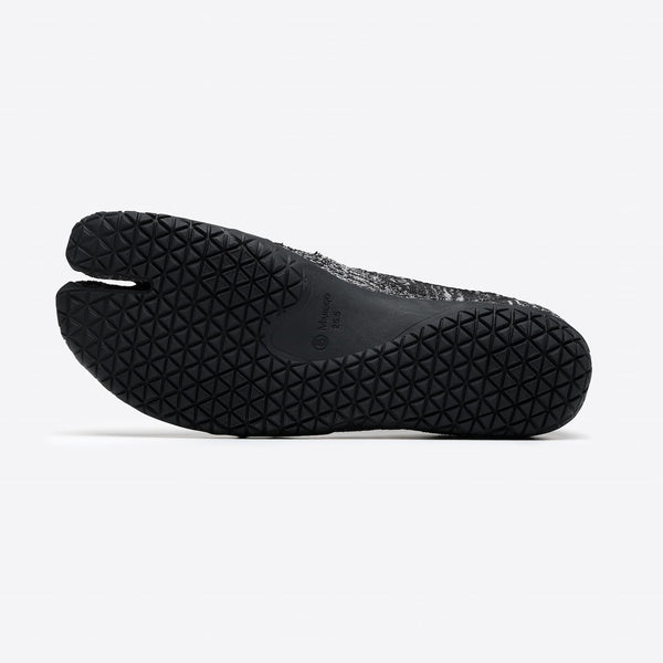 Outsole view of zebra white Tabi Shoes 