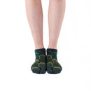 Person wearing short green Tabi Socks " Kamakura Daibutsu ", front view