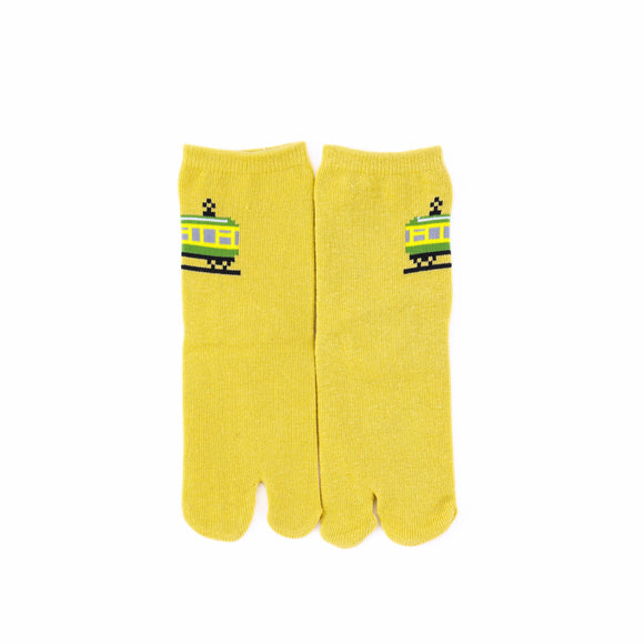 Front view of long yellow Tabi Socks " Pixel Densha "– children's size