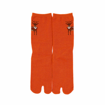 Front view of long orange Tabi Socks " Pixel Shika "