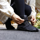 Black SPORTS JOG II tabi shoes featuring a lace-up design and split-toe construction, designed for active everyday wear.