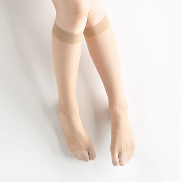 Person wearing Tabi-style stockings " ＆TABI ", right side view