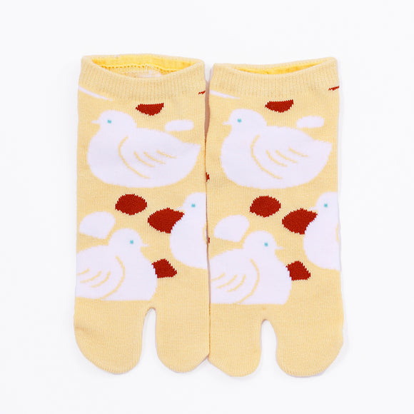 Front view of short yellow Tabi Socks " Hato"