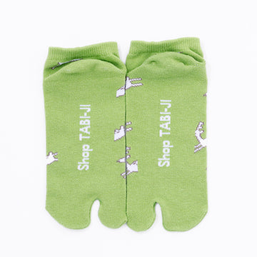 Back view of short green Tabi Socks " Shika Hashiru "