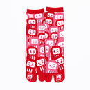 Front view of long red Tabi Socks " Daruma "