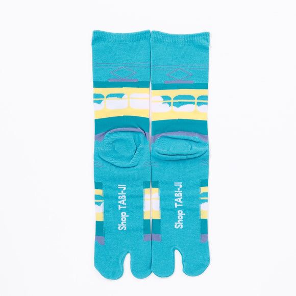 Back view of long green Tabi Socks " Densha "