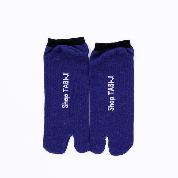 Back view of short navy Tabi Socks " Tai "