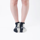 Person wearing short black Tabi Socks " Goen ", front view