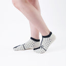 Person wearing short black Tabi Socks " Goen ", right side view