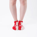 Person wearing short red Tabi Socks " Goen ", front view