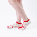 Person wearing short red Tabi Socks " Goen ", right side view