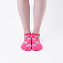 Person wearing short pink Tabi Socks " Kamakura Daibutsu ", front view