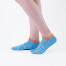 Person wearing short light blue Tabi Socks " Shirasu ", right side view