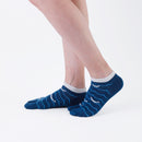 Person wearing short blue Tabi Socks " Shirasu ", right side view