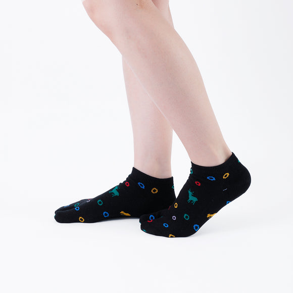 Person wearing short black Tabi Socks " Shika & Wa ", right side view
