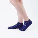 Person wearing short blue Tabi Socks " Shika & Wa ", right side view