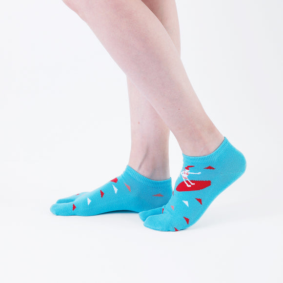Person wearing short light blue Tabi Socks " Surfer ", right side view