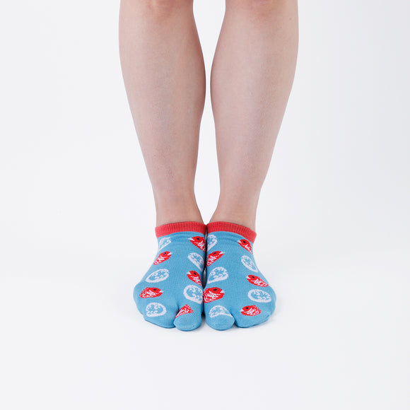 Person wearing short light blue Tabi Socks " Tai ", front view
