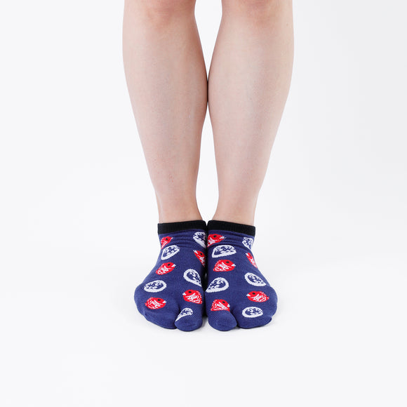 Person wearing short navy Tabi Socks " Tai ", front view