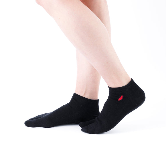 Person wearing long black Tabi Socks "TABI-JI", front view