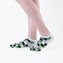 Person wearing short black Tabi Socks " Chigiri-e ", right side view