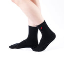 Person wearing long black Tabi Socks "TABI-JI", right side view