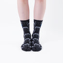 Person wearing long black Tabi Socks " Kamakura Daibutsu ", front view