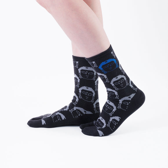 Person wearing long black Tabi Socks " Kamakura Daibutsu ", right side view