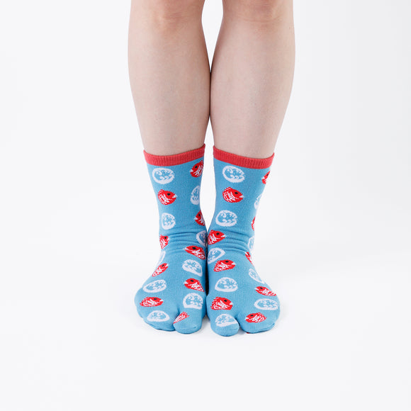 Person wearing long light blue Tabi Socks " Tai ", front view