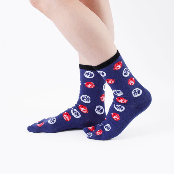 Person wearing long navy Tabi Socks " Tai ", right side view