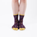 Person wearing long purple Tabi Socks " Shika Origami ", front view