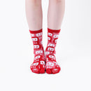 Person wearing long red Tabi Socks " Daruma ", front view
