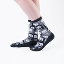 Person wearing long black Tabi Socks " Daruma ", right side view
