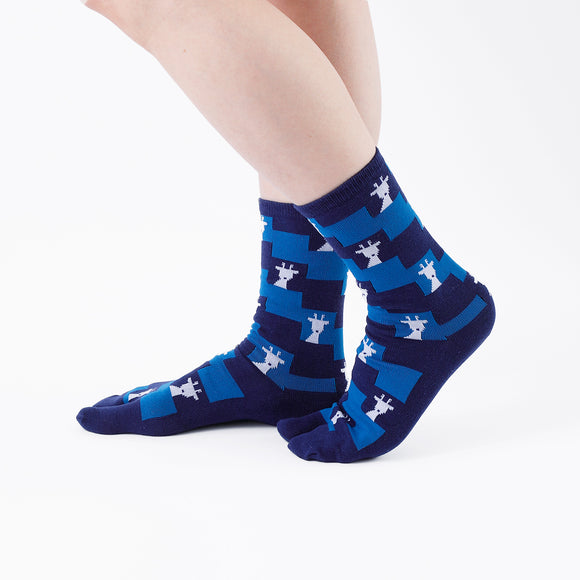 Person wearing long blue Tabi Socks " Shika Nozoku ", right side view
