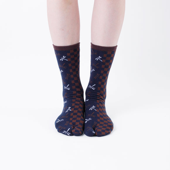 Person wearing long navy Tabi Socks " Tonbo & Ichimatsu ", front view