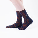 Person wearing long navy Tabi Socks " Tonbo & Ichimatsu ", right side view