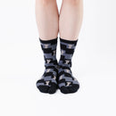 Person wearing long black Tabi Socks " Shika Nozoku ", front view