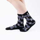 Person wearing long black Tabi Socks " Shika Nozoku ", right side view