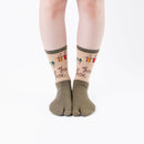 Person wearing long green Tabi Socks " Nara-e ", front view