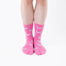Person wearing long pink Tabi Socks " Shika Hashiru ", front view