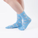 Person wearing long blue Tabi Socks " Shika Hashiru ", right side view