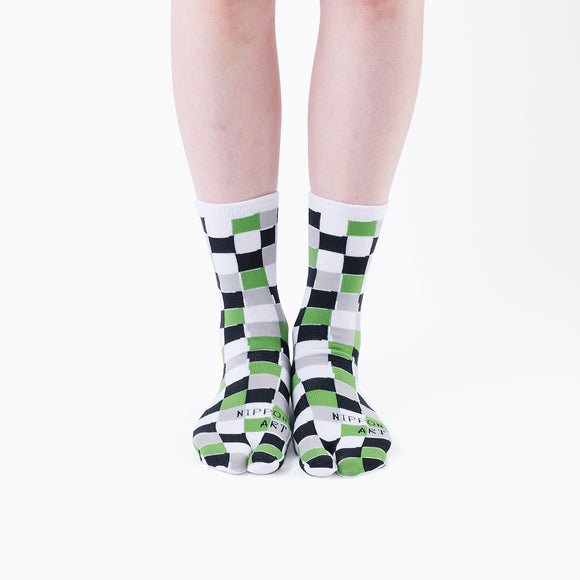 Person wearing long black Tabi Socks " Chigiri-e ", front view