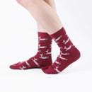 Person wearing long red Tabi Socks " Shika Hashiru ", right side view